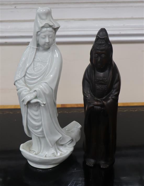 A Chinese blanc de chine figure of Guanyin and a bronze figure of Guanyin tallest 30.5cm